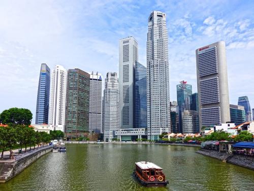 Singapore and Malaysia unveil trading link plan 